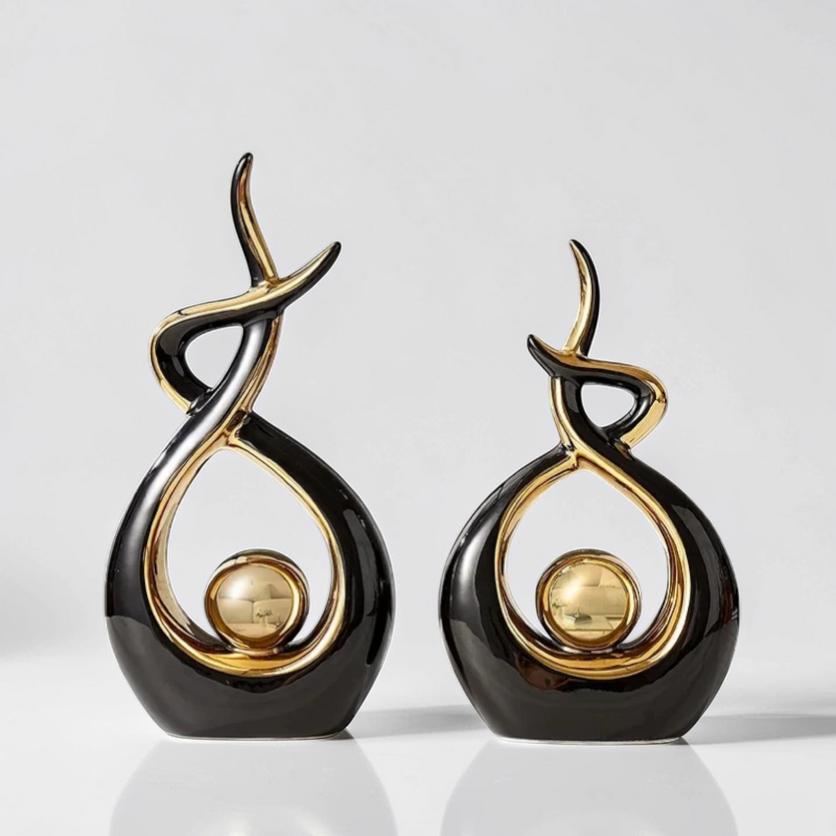 Black and gold abstract ceramic sculpture two sizes