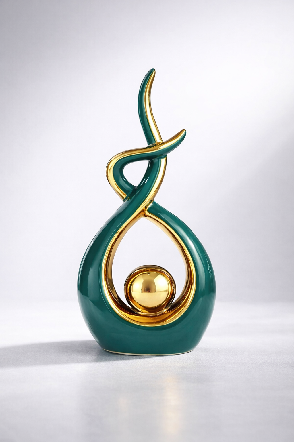 Green and gold abstract ceramic sculpture