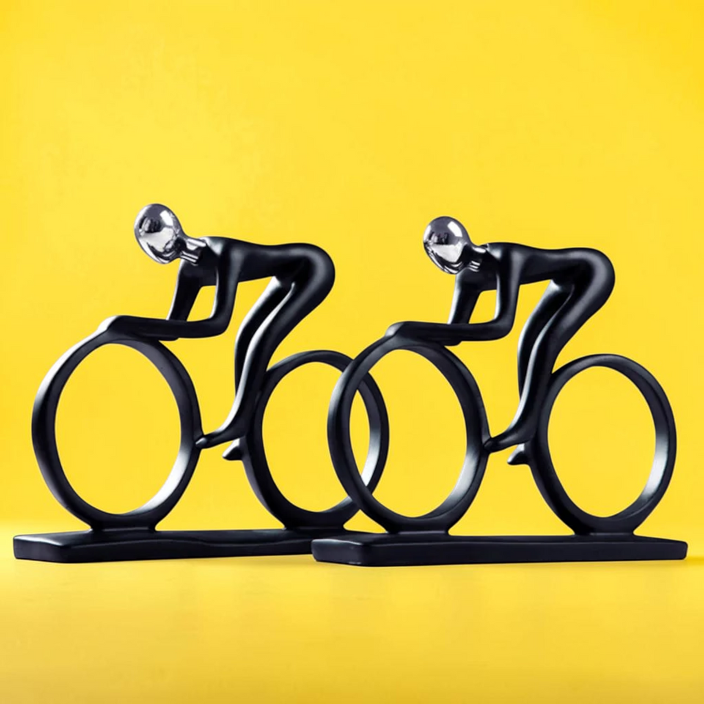 Set of two cyclist sculptures