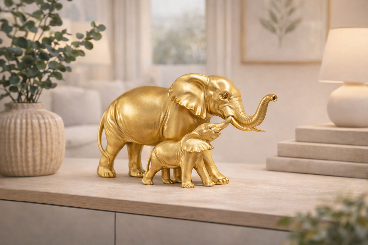 Gold elephant figurine pair styled on a modern console