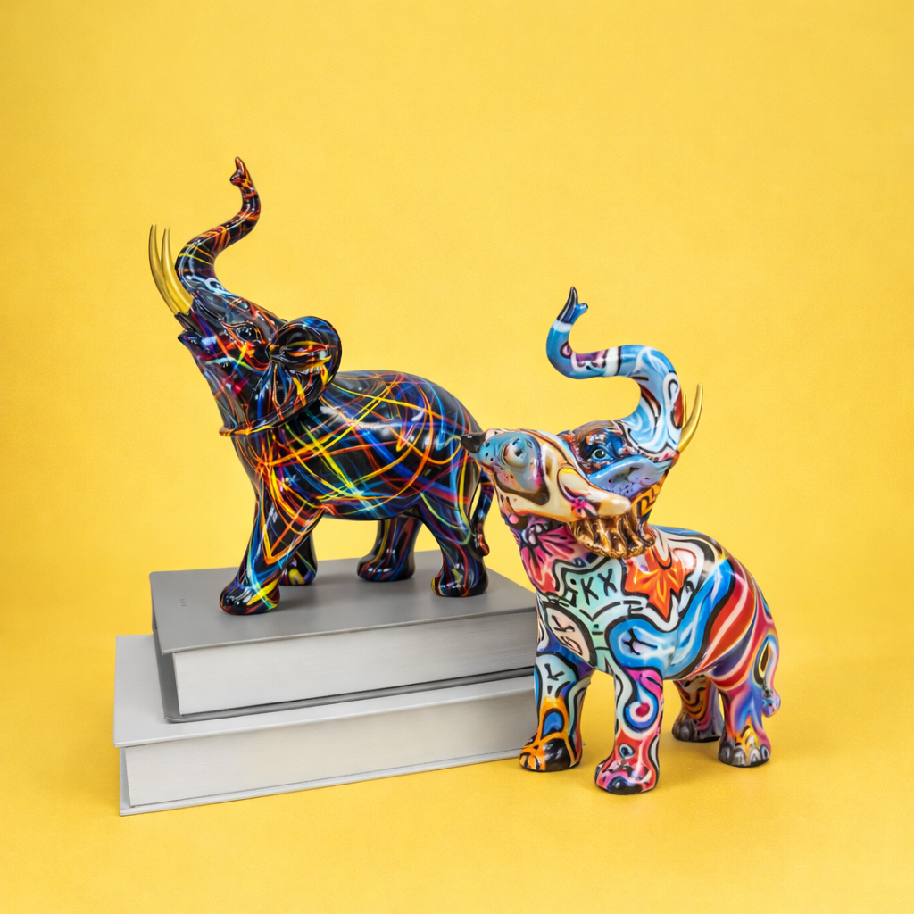 Two colorful elephant figurines
