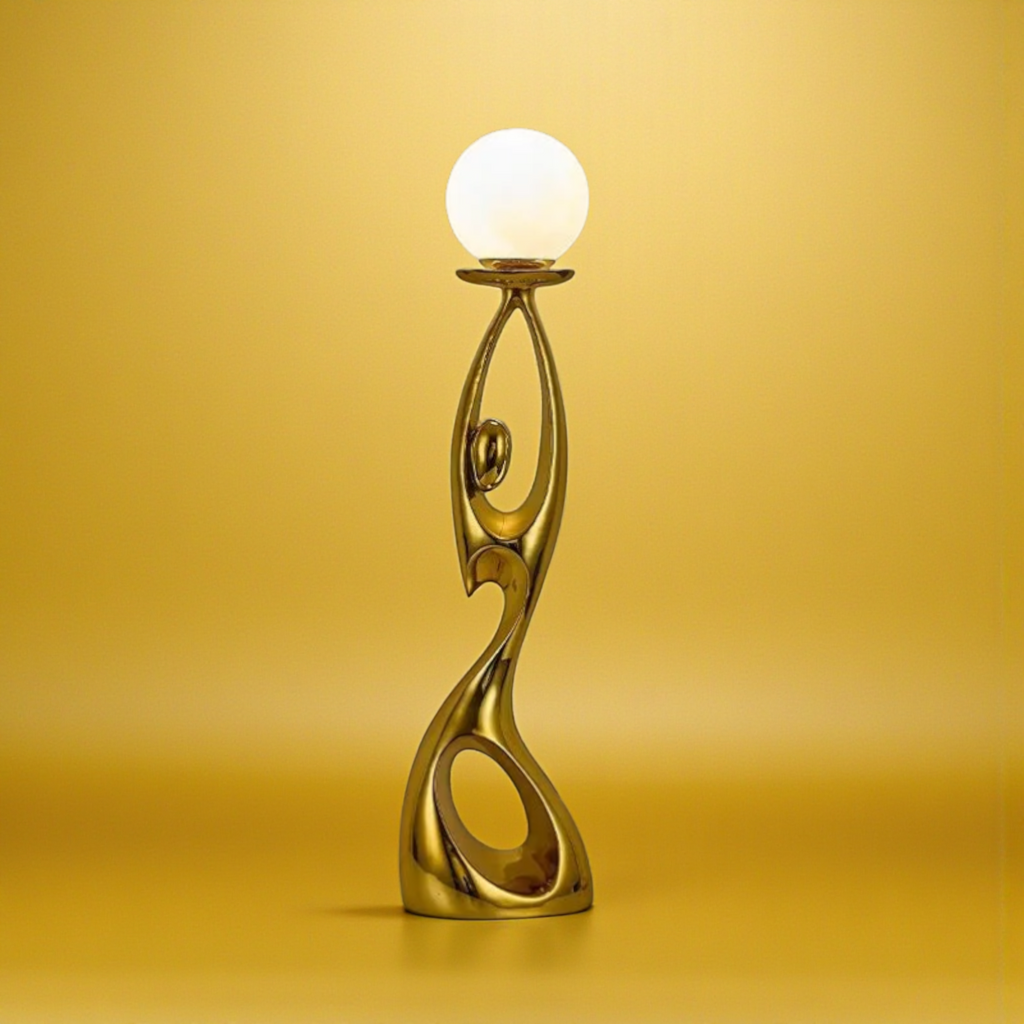 Gold abstract floor sculpture with globe lamp