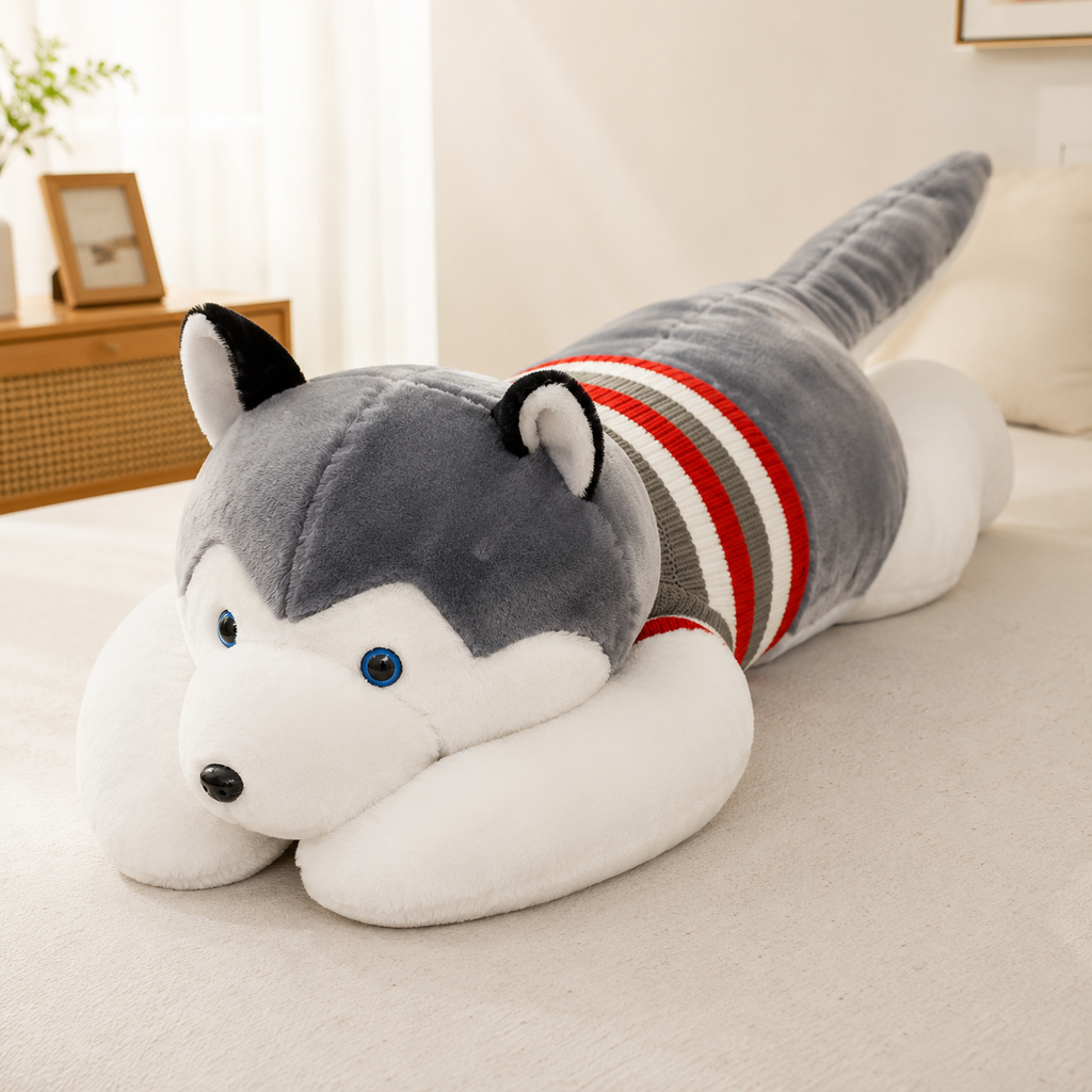 Long Husky plush body pillow on a bed