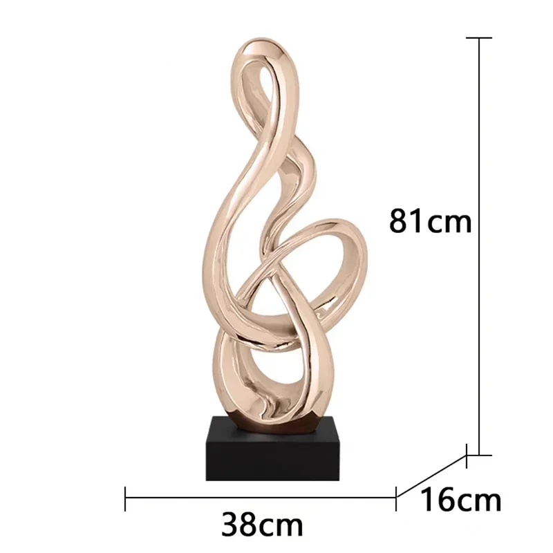 Gold abstract treble clef sculpture size 38 x 16 x 81 cm