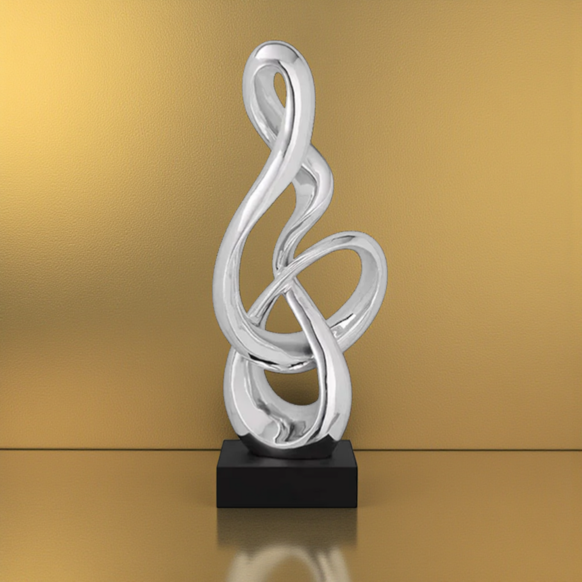 Silver abstract treble clef sculpture with black base
