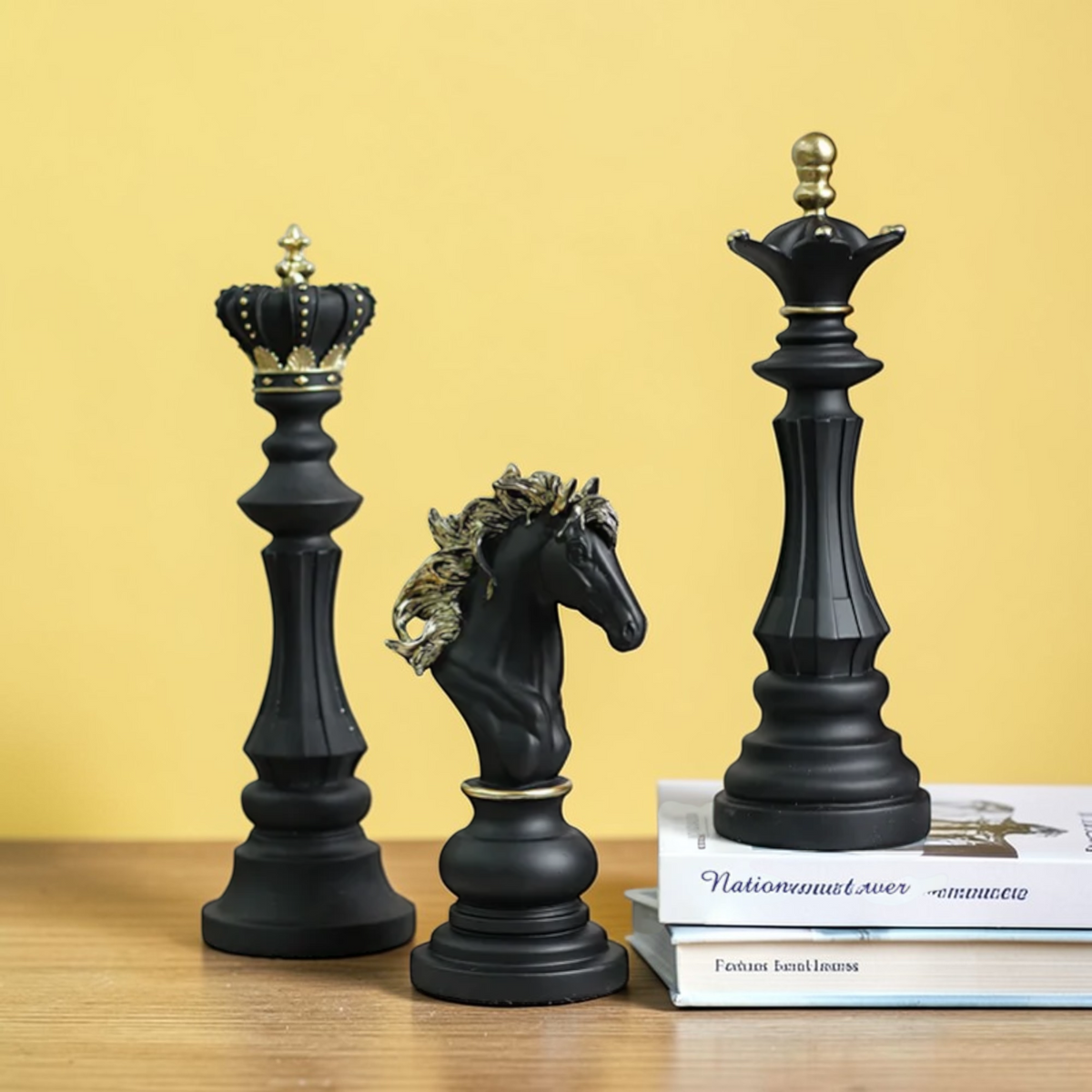 Black king queen and knight chess decor on yellow background