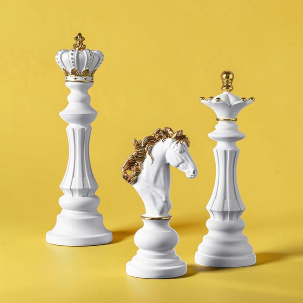White luxury chess piece decor set with gold accents