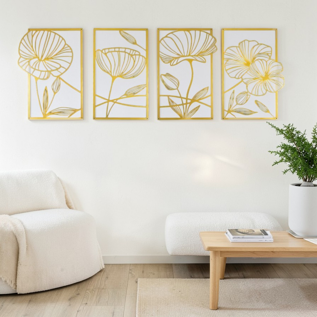Gold floral metal wall art set displayed in bright living room