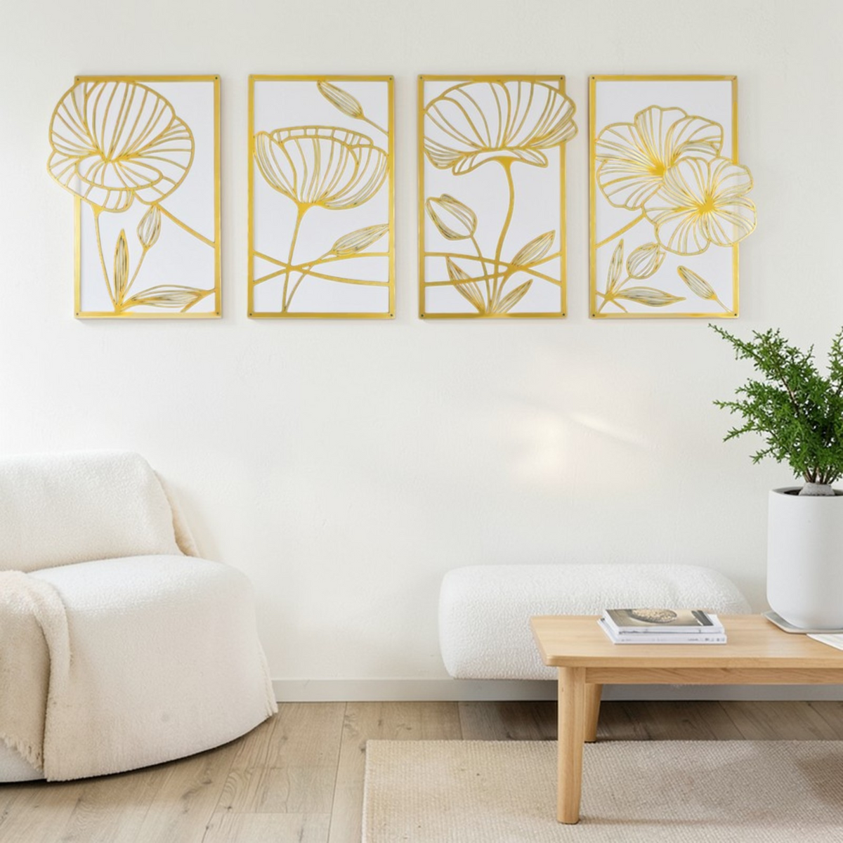 Gold floral metal wall art set displayed in bright living room