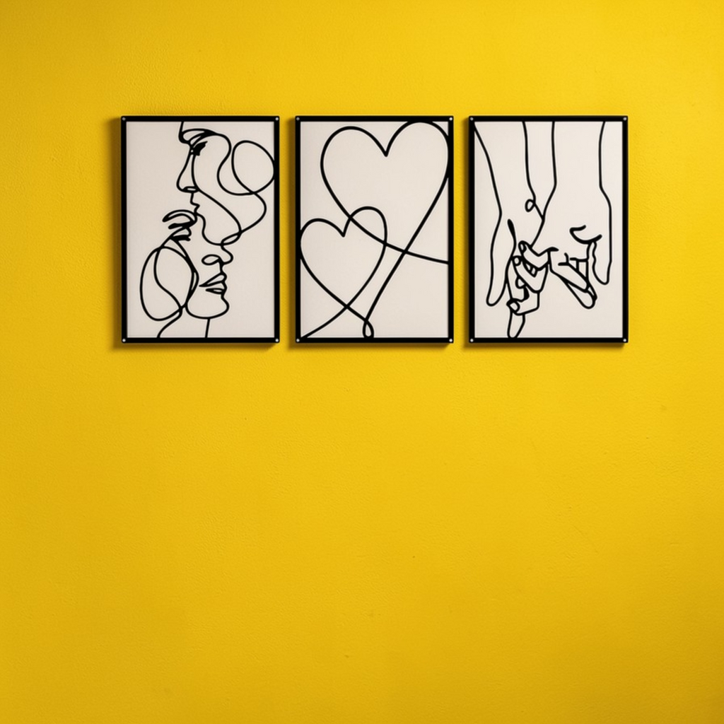 Set of 3 minimalist black metal wall art panels on yellow wall