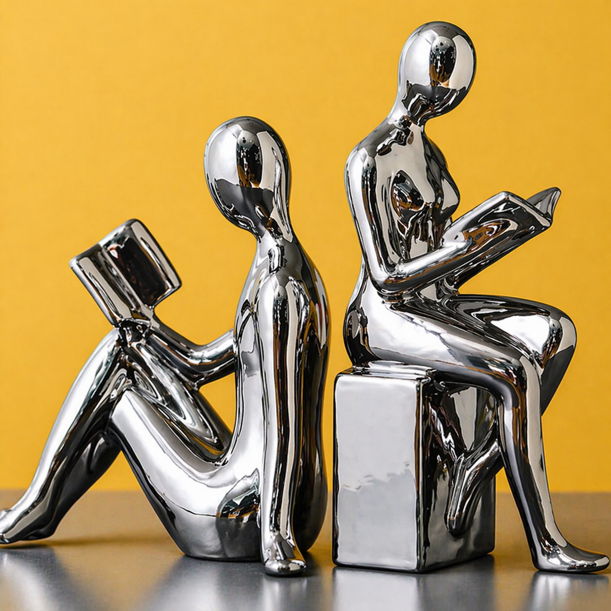 Silver minimalist reading figure bookends
