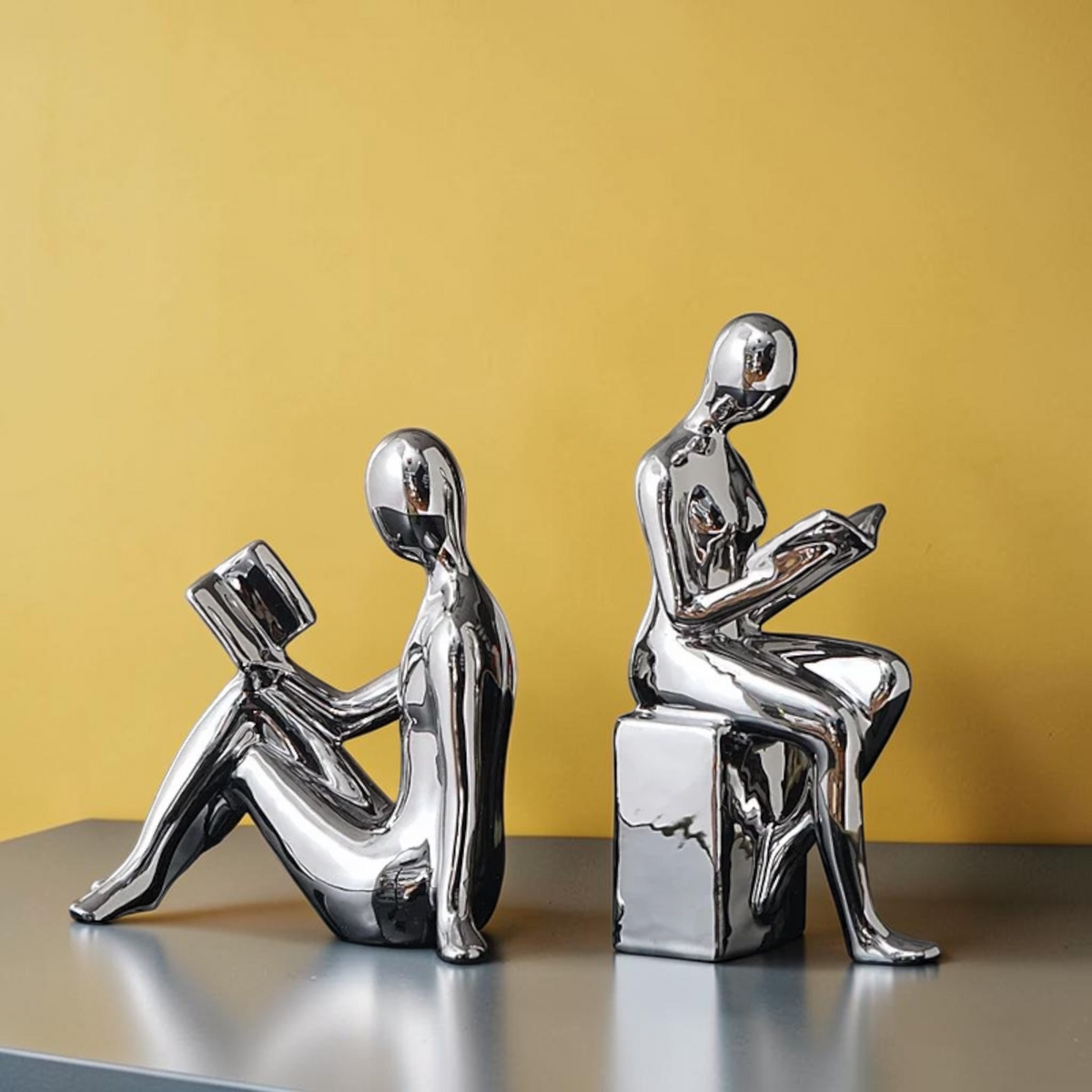 Silver minimalist reading figure bookends product view