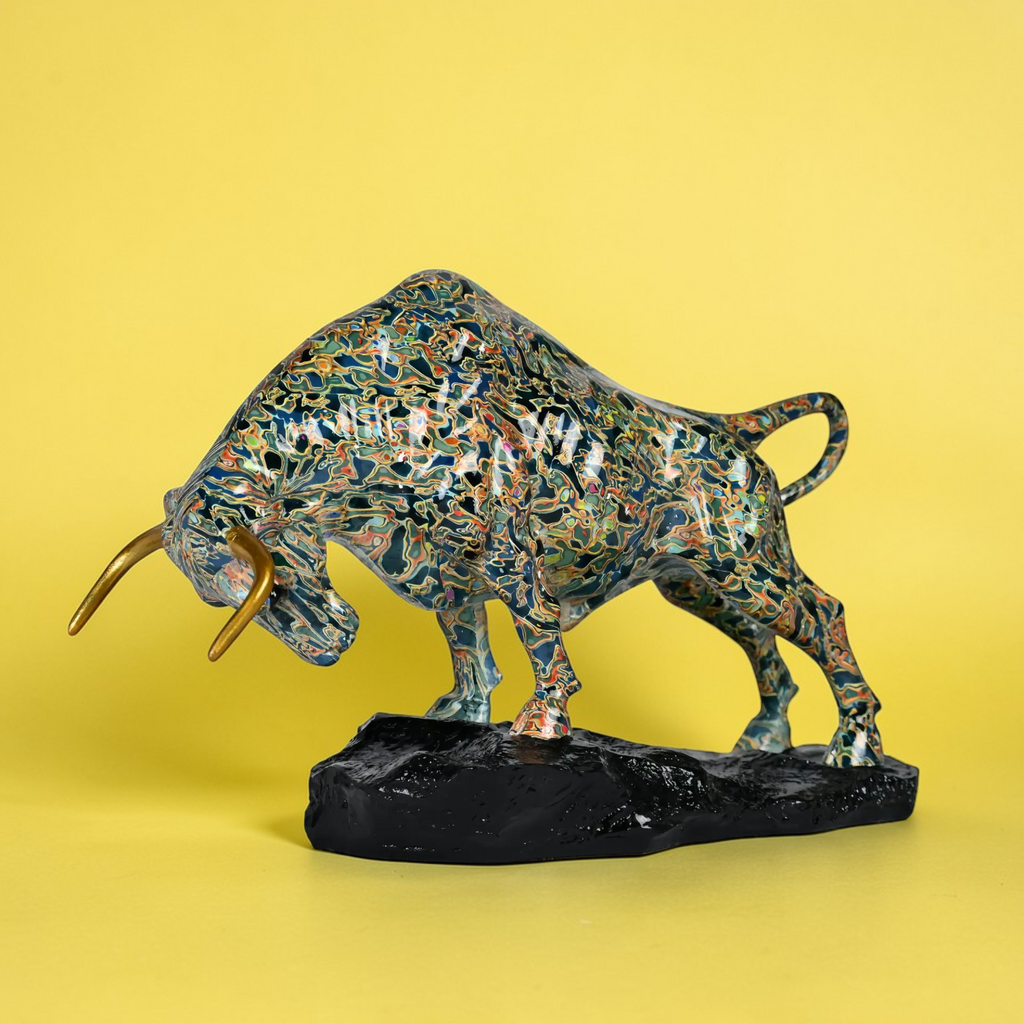 Classical Bull sculpture on yellow background