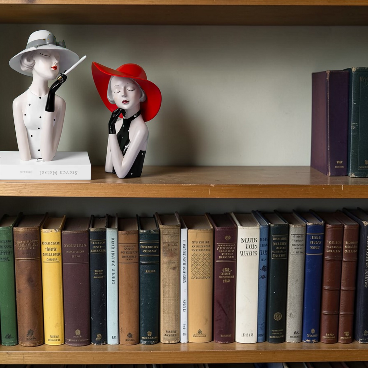 Modern lady sculpture set styled on a bookshelf