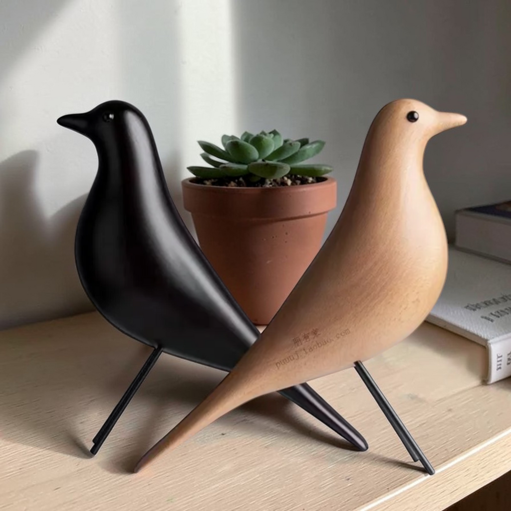 Close-up of black and natural wooden bird shelf ornaments