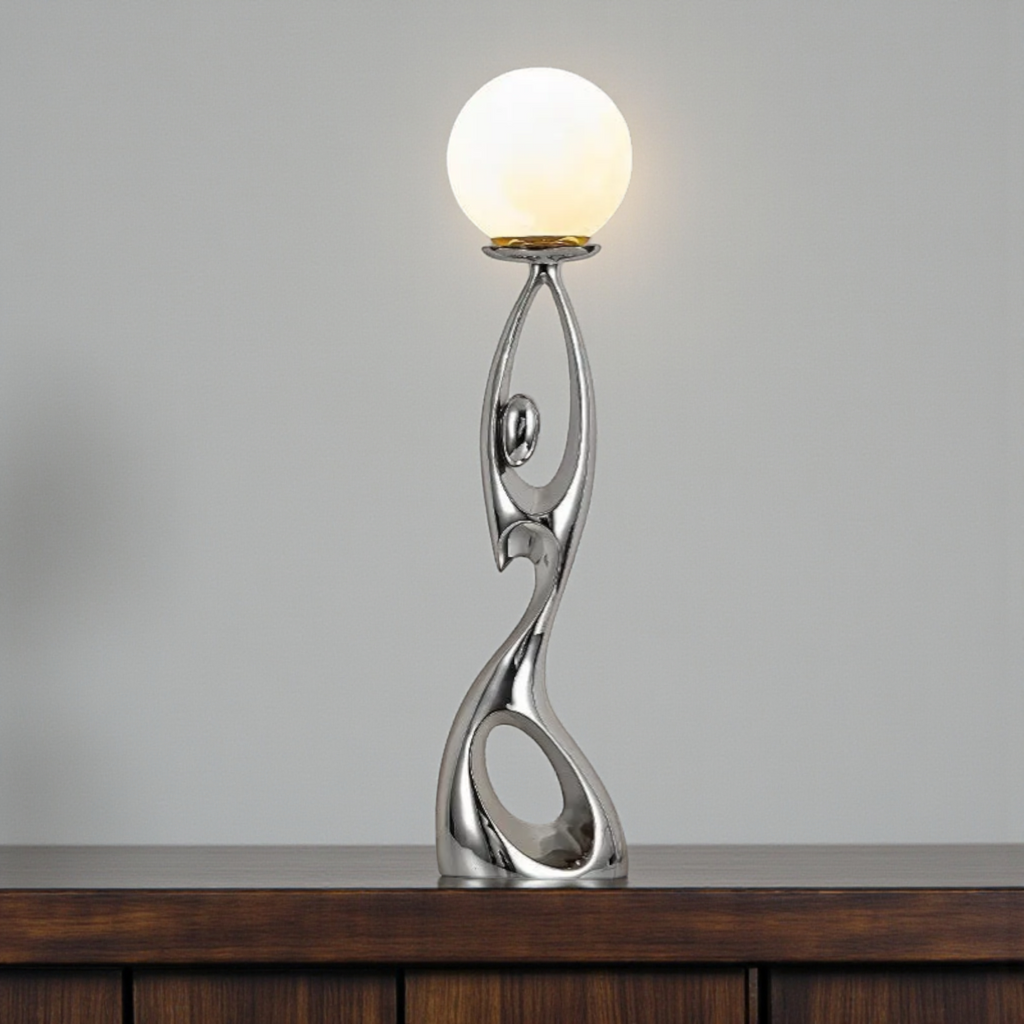 Silver abstract floor sculpture with globe lamp