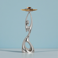 Silver abstract floor sculpture with tray table