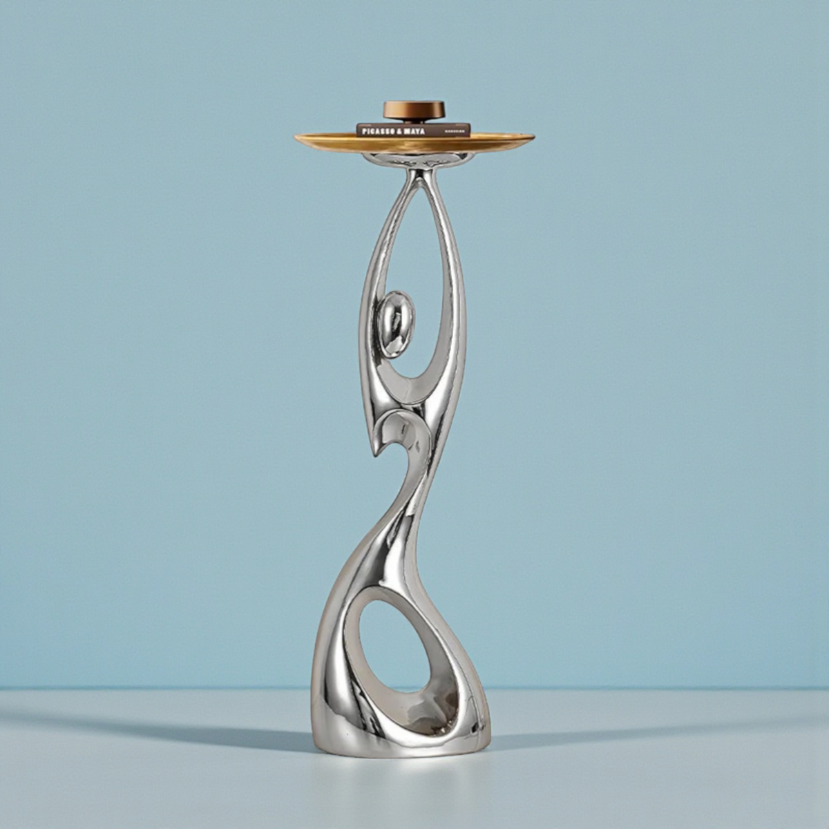 Silver abstract floor sculpture with tray table