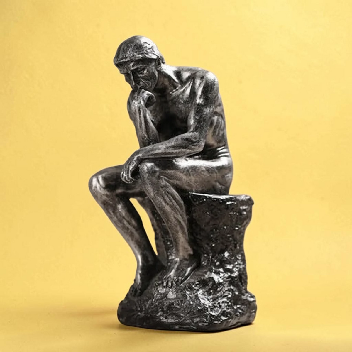 Charcoal Thinking Man sculpture