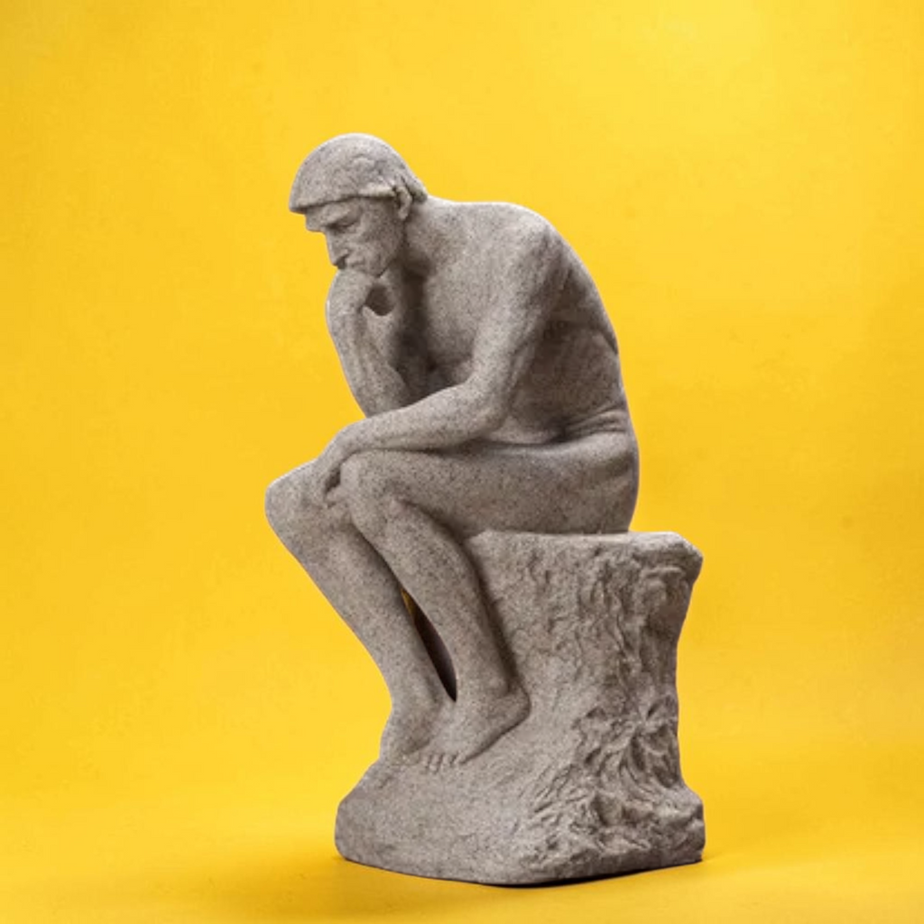 Ivory Thinking Man sculpture