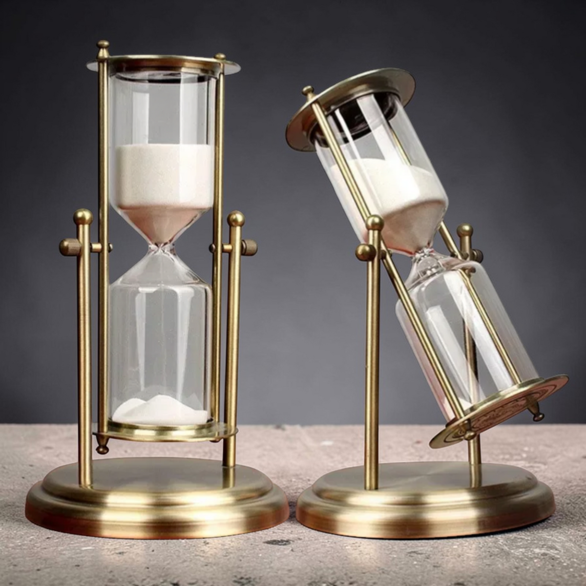 Vintage brass hourglass upright and rotating positions