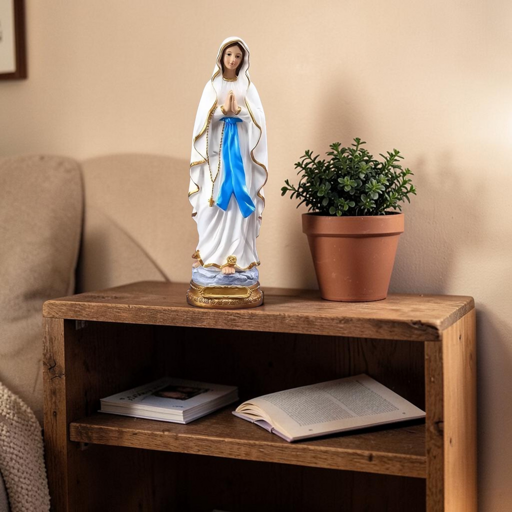 Virgin Mary statue on shelf